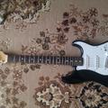 Альбом - електро гітара Squier stratocaster by Fender made in japan